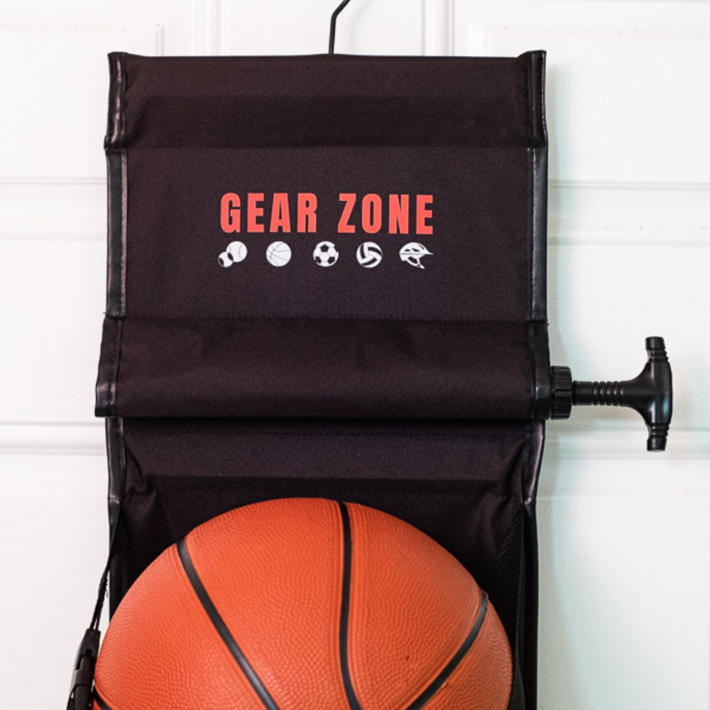 Gear Zone kid grabbing ball from organizer demonstrating fast retrieval and family-friendly benefit