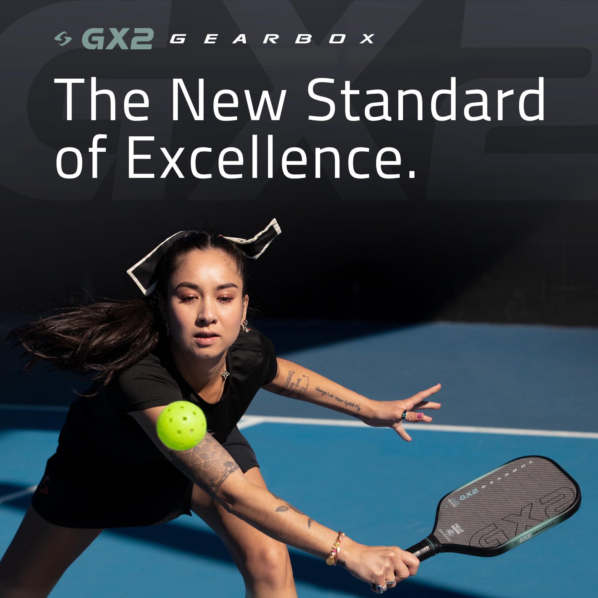 Gearbox GX2 Integra XL next to pickleball for scale showing enhanced hitting area