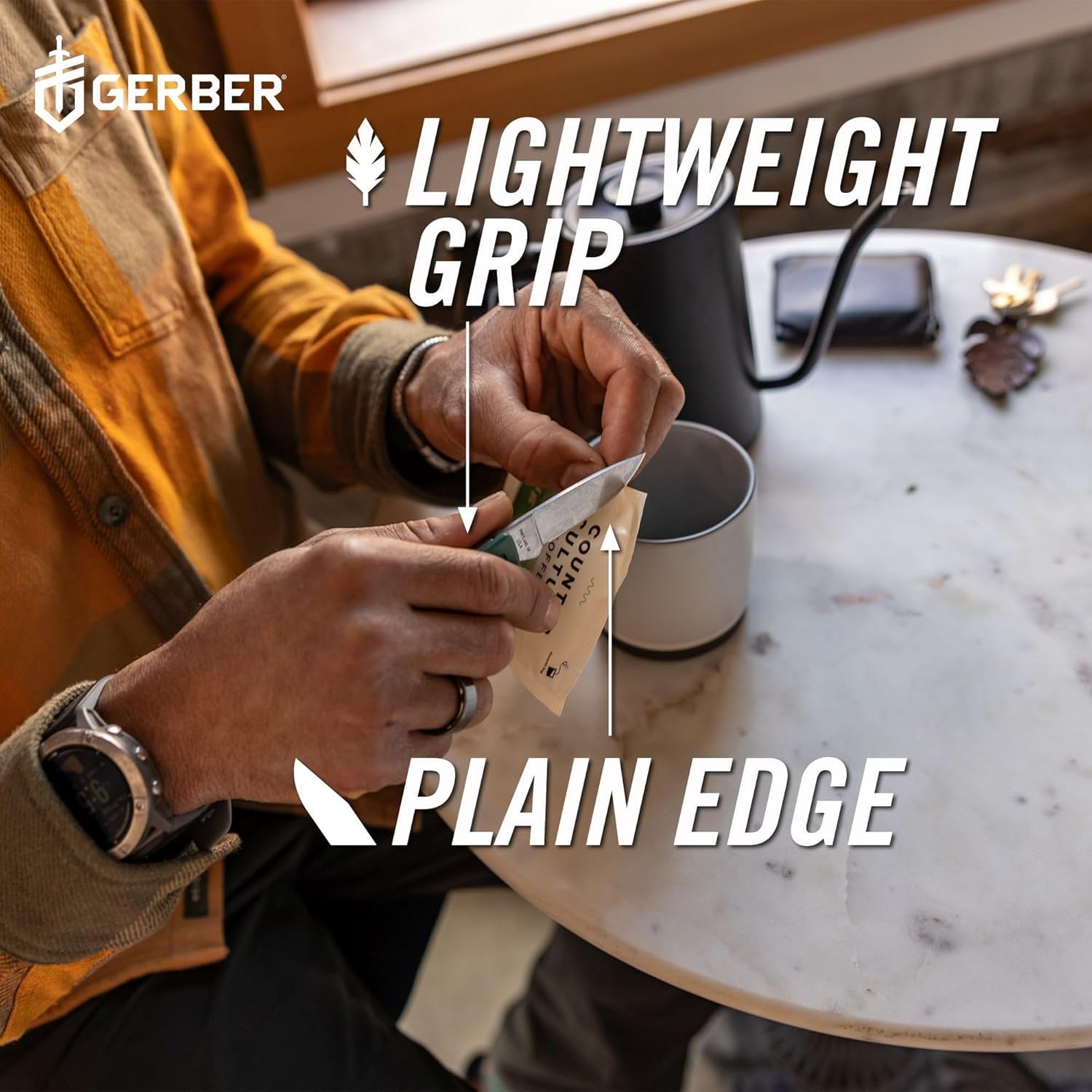 Gerber LST Ultra lanyard hole detail for quick attachment and retrieval