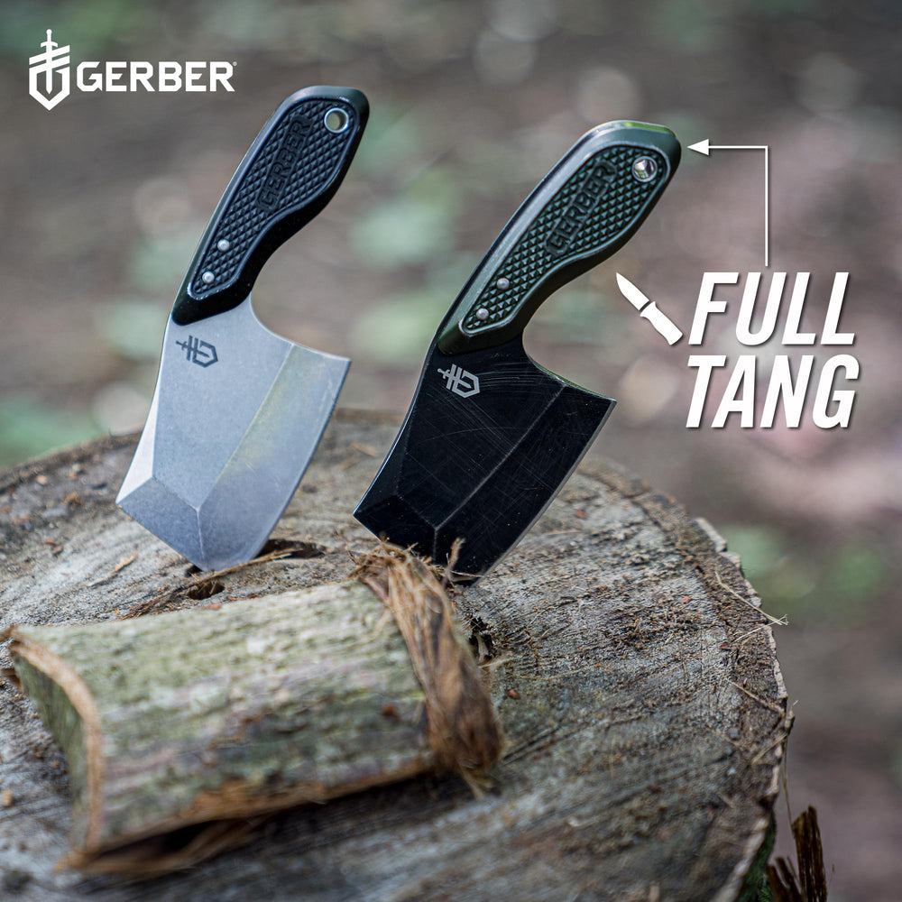 Gerber cleaver held in hand for scale comparison illustrating compact portability