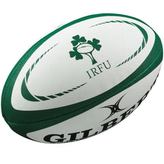 Gilbert ball in play on grass pitch showing practical use for training and recreation