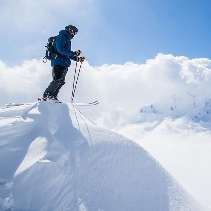 Giro Cruz in use on snowy slope showing helmet compatibility and peripheral view