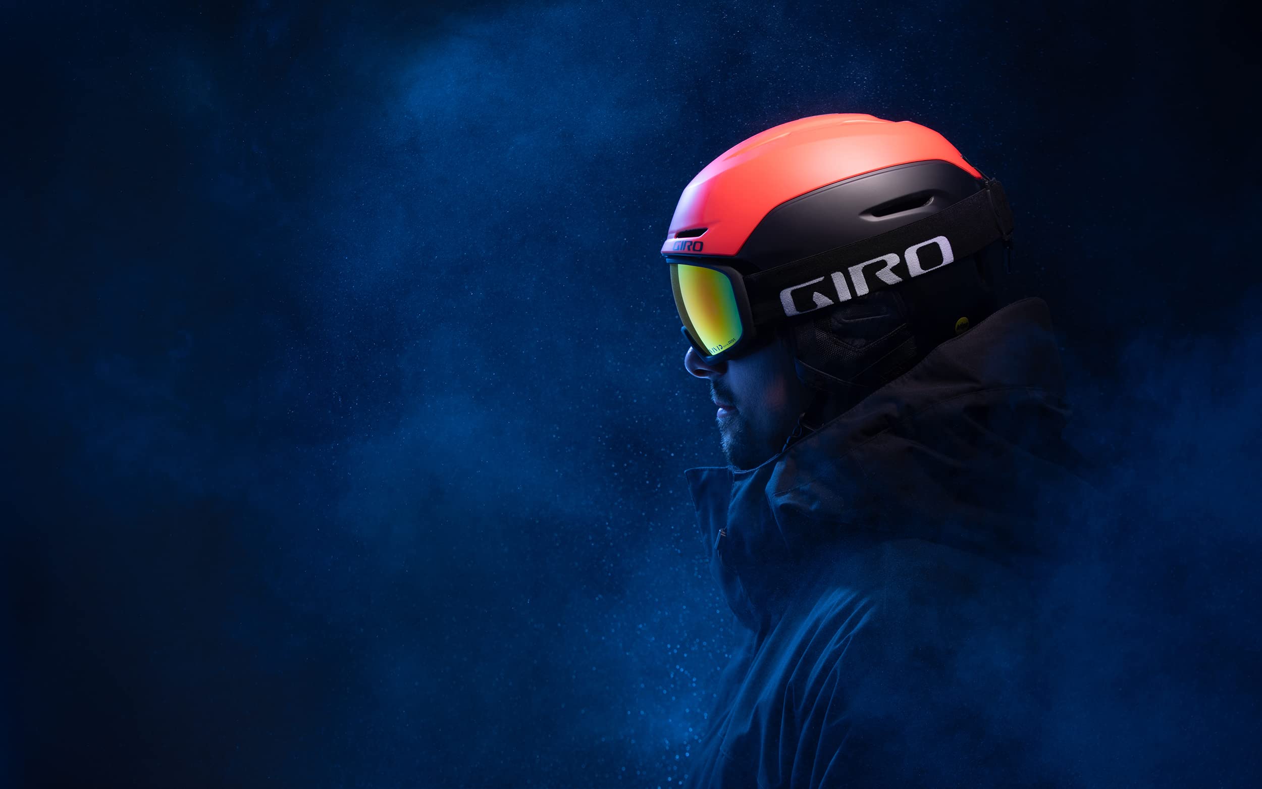 Giro Neo helmet worn on skier at resort showing integrated fit and on-the-go ventilation