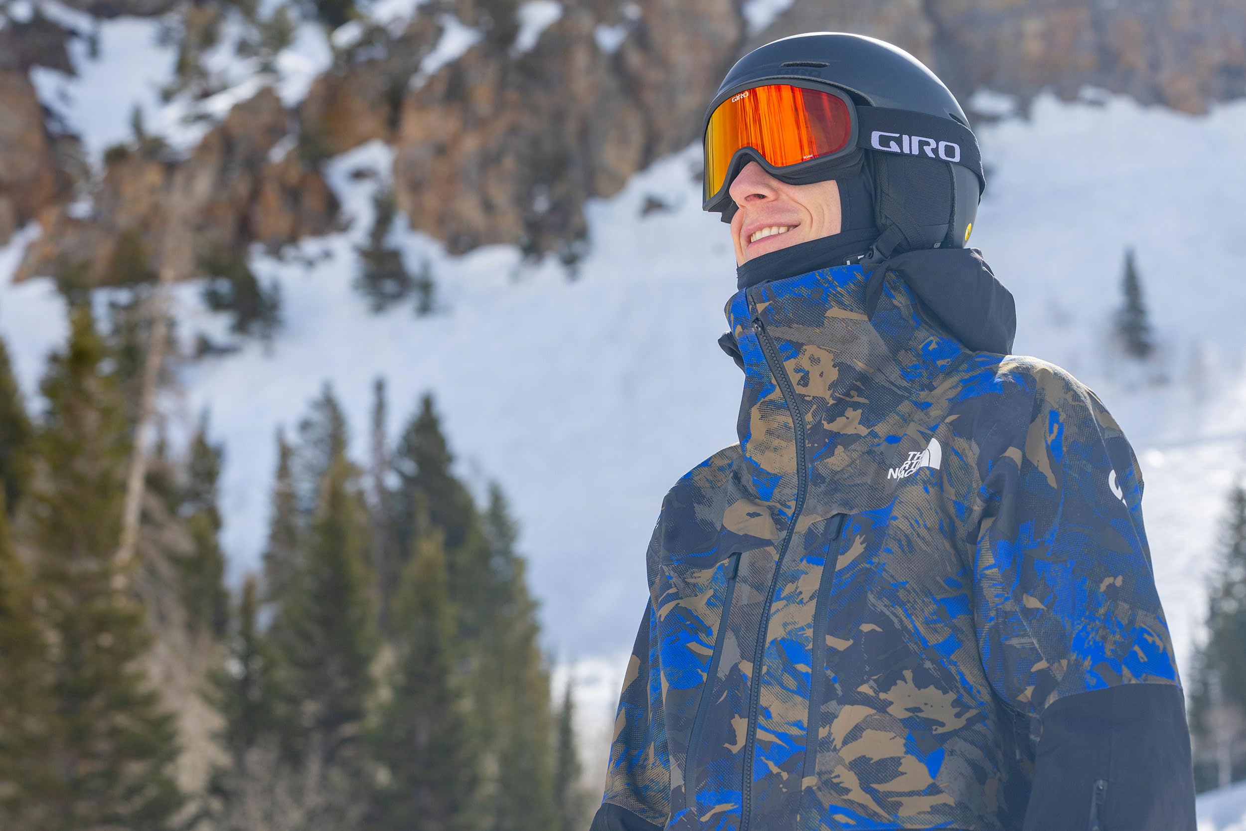 Giro Neo MIPS paired with Giro goggles in a snowy setting showing secure goggle compatibility