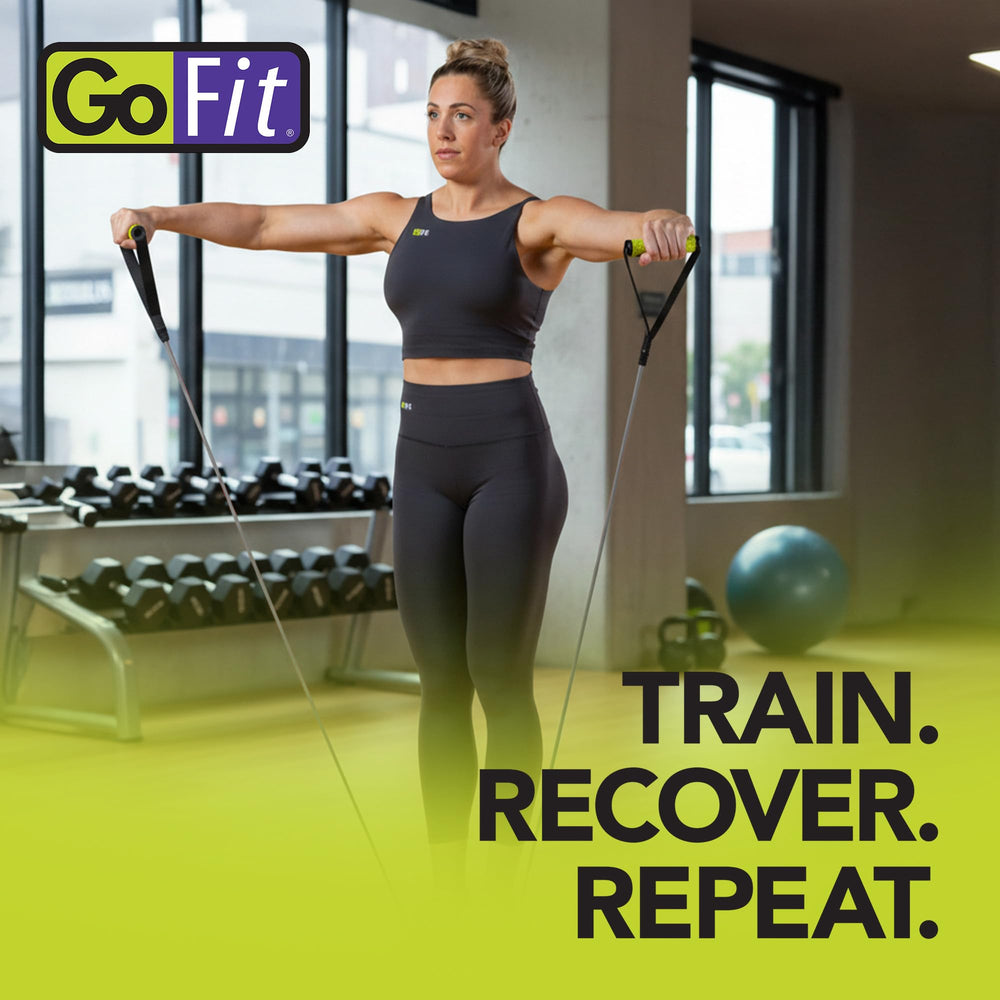 GoFit power tube next to water bottle showing compact size for easy packing