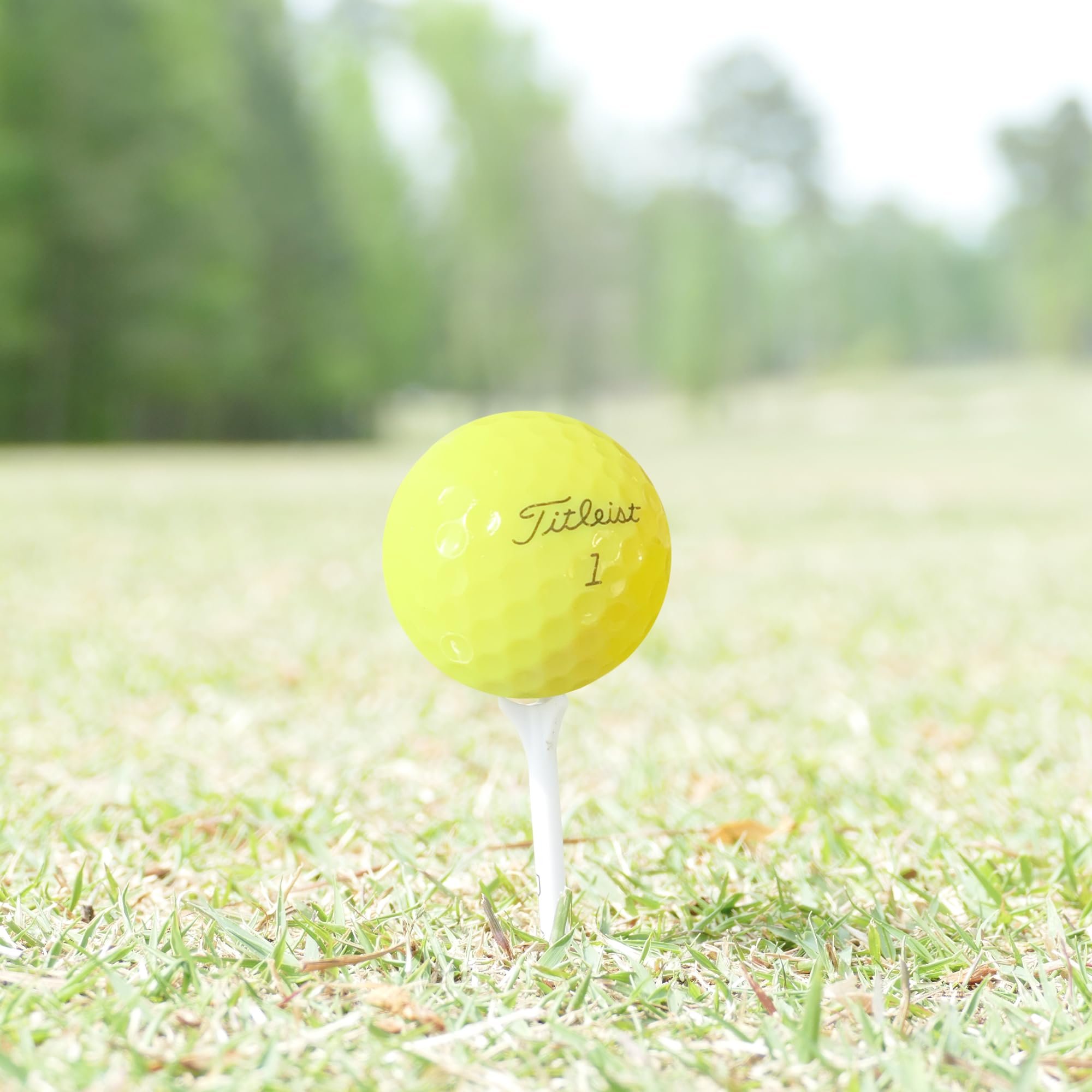 GolfBall Nut stacked pile of balls displaying bright yellow color for easy tracking