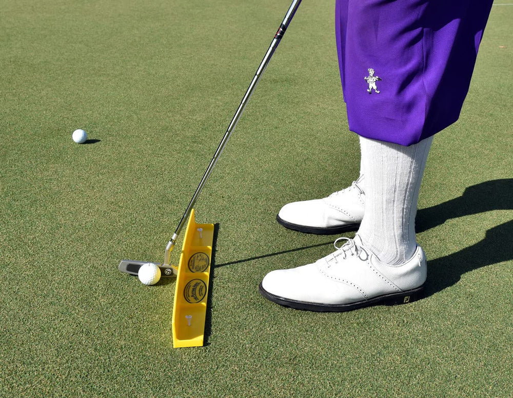 GolfTrainingAids T3 next to a putter to show scale and correct arc fit for stroke length