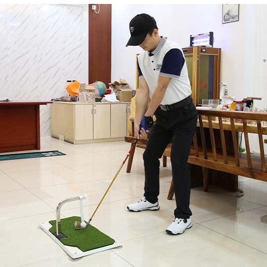 Golfupp size comparison with club showing scale for realistic swing practice