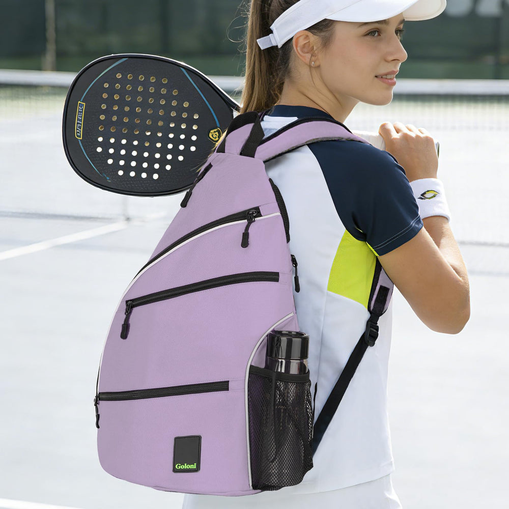 Goloni bag hung on a tennis fence demonstrating hands-free court storage