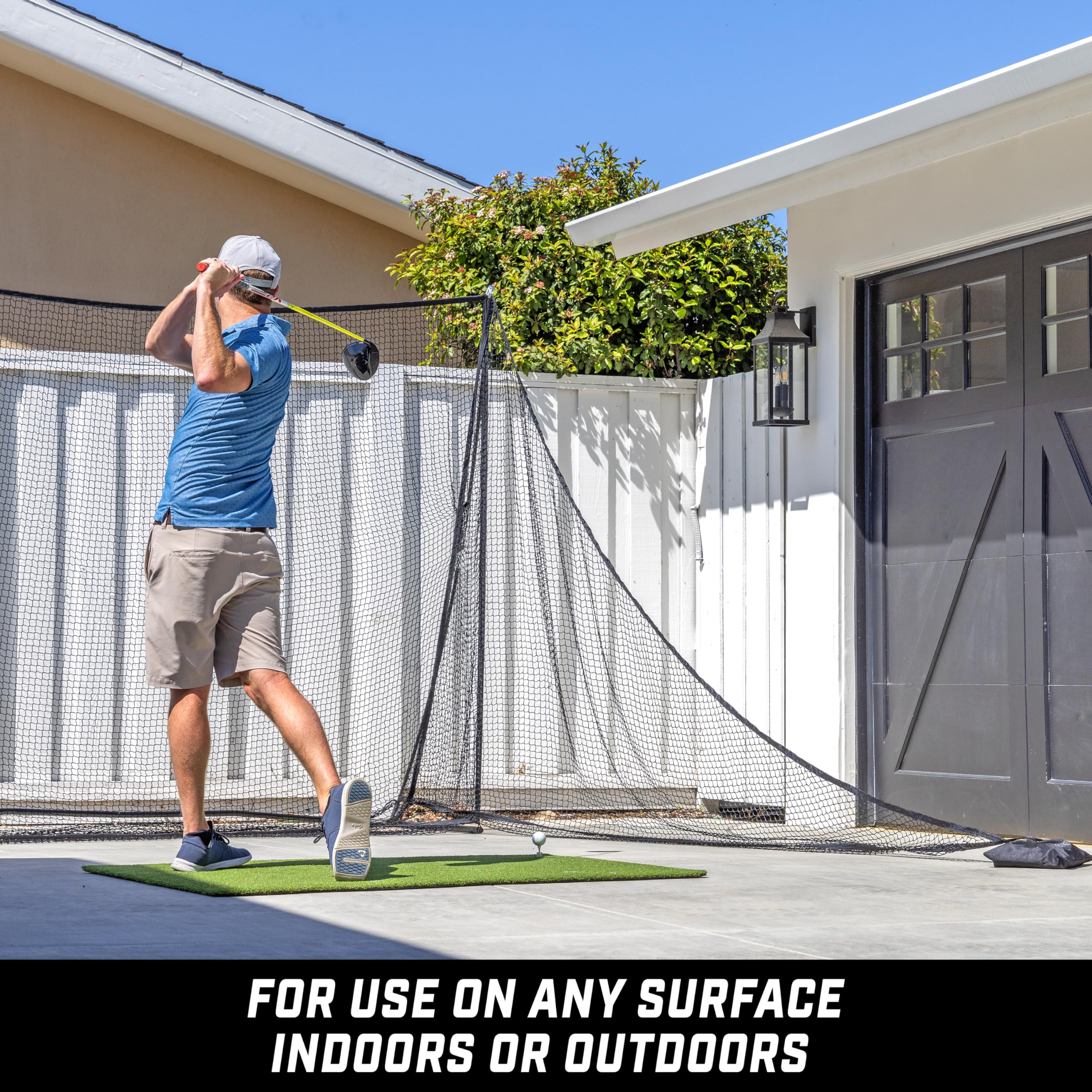 GoSports shank net in use on right side capturing errant shots for safer practice