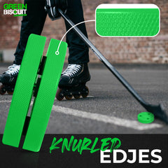 Green Biscuit sliding on a driveway showing consistent glide on asphalt