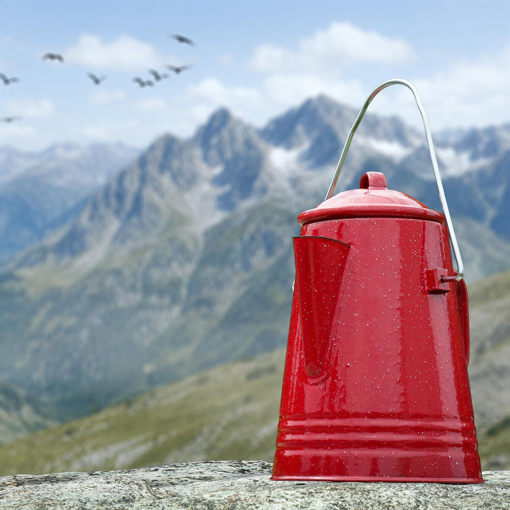 GRIP percolator perched over campfire demonstrating stable outdoor brewing
