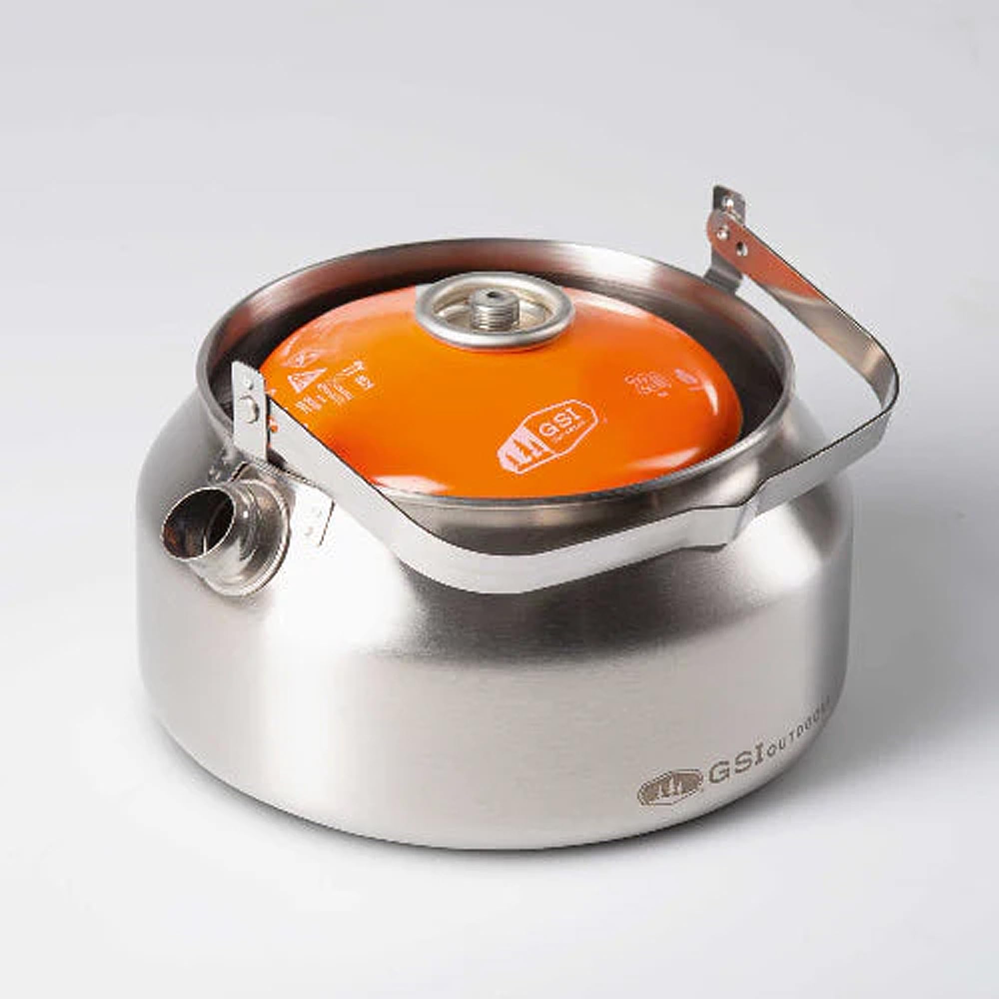 GSI Outdoors kettle beside water bottle showing one-quart capacity benefit