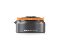 GSI Outdoors Halulite kettle boiling on a camp stove demonstrating fast heating and fuel savings in the field