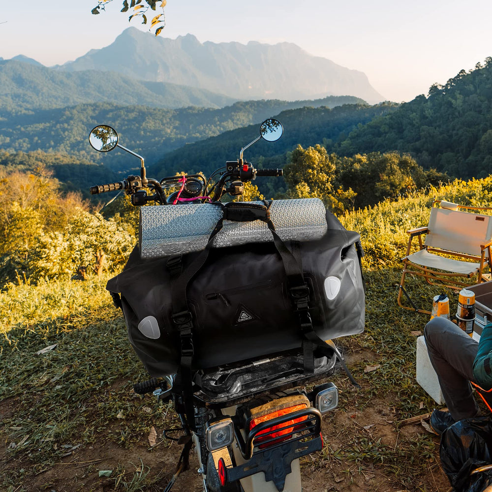 Haimont next to a helmet and camping gear showing true 70L capacity