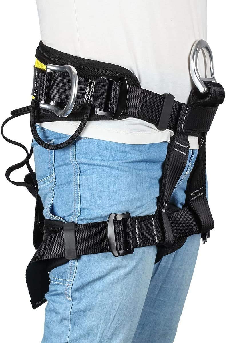 HandAcc harness in use on rock face demonstrating secure suspension