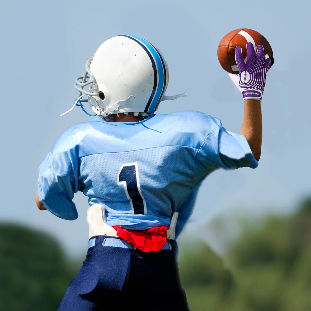 HANDLANDY youth player on field wearing gloves, supports active play