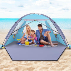 HAPPY TRAVEL front view of beach tent showing full shade and family capacity