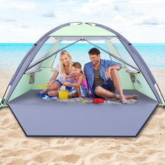 HAPPY TRAVEL front view showing full shaded beach shelter and family benefit