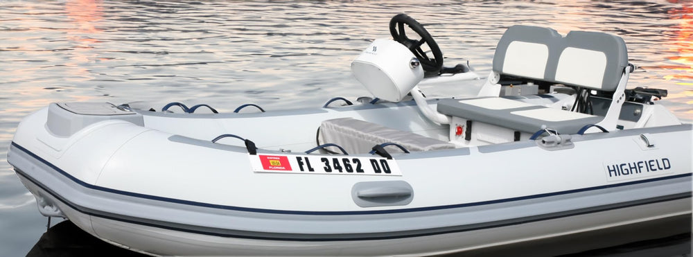 Hardline Products plate mounted on inflatable dinghy demonstrating no-adhesive protection