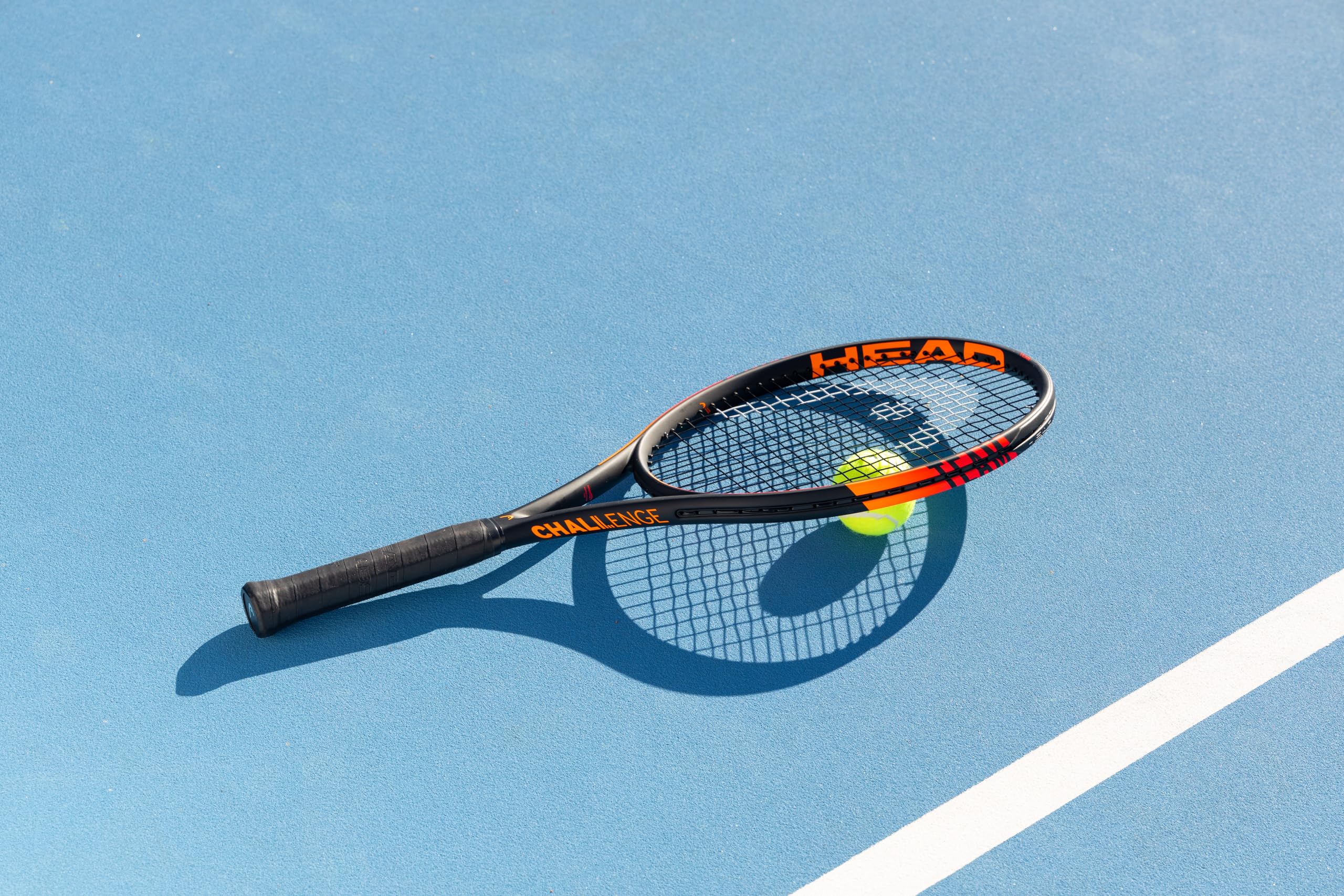 HEAD pre-packaged racquet with label showing ready-to-play convenience