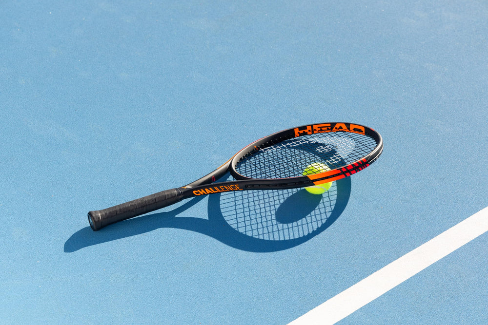 HEAD pre-packaged racquet with label showing ready-to-play convenience