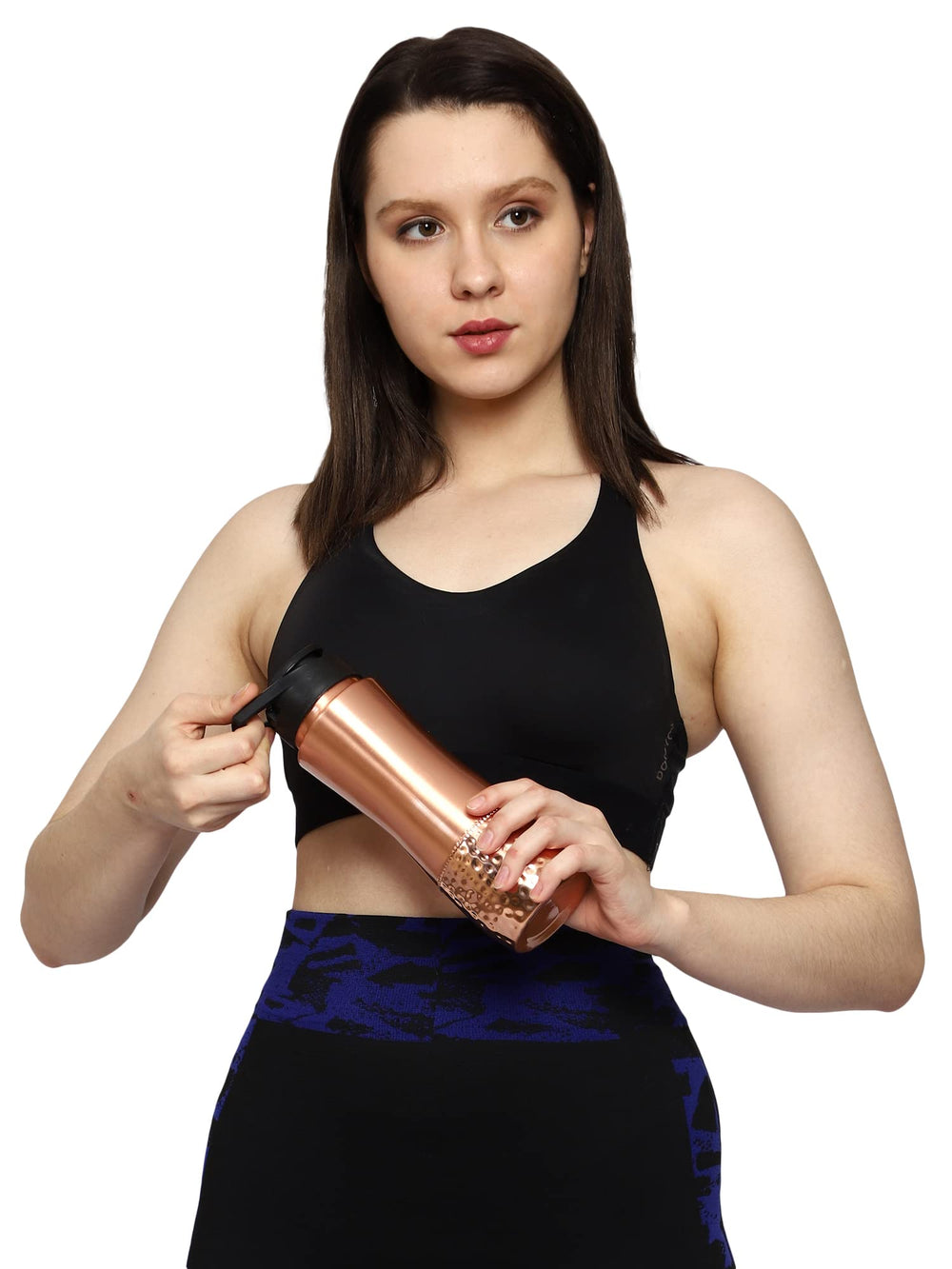 HealthGoodsIn bottle on a yoga mat suggesting wellness routine and daily use