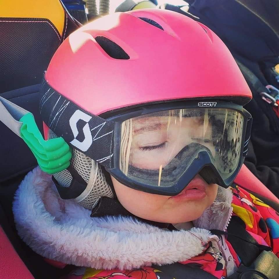 Helmet-Hands Blue attached to UTV seat frame showing secure anchor benefit