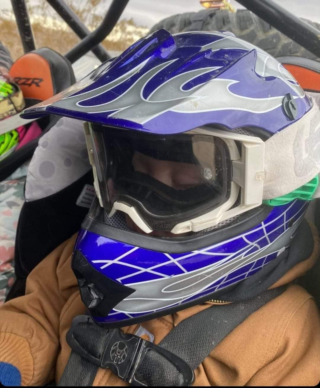 Helmet-Hands Blue next to ruler showing compact size and adjustable fit benefit