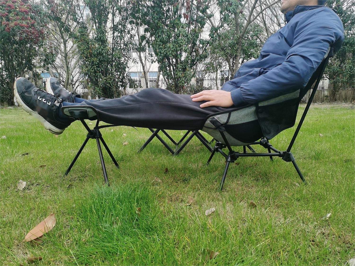 HI SUYI stool next to backpack for scale showing lightweight packable benefit