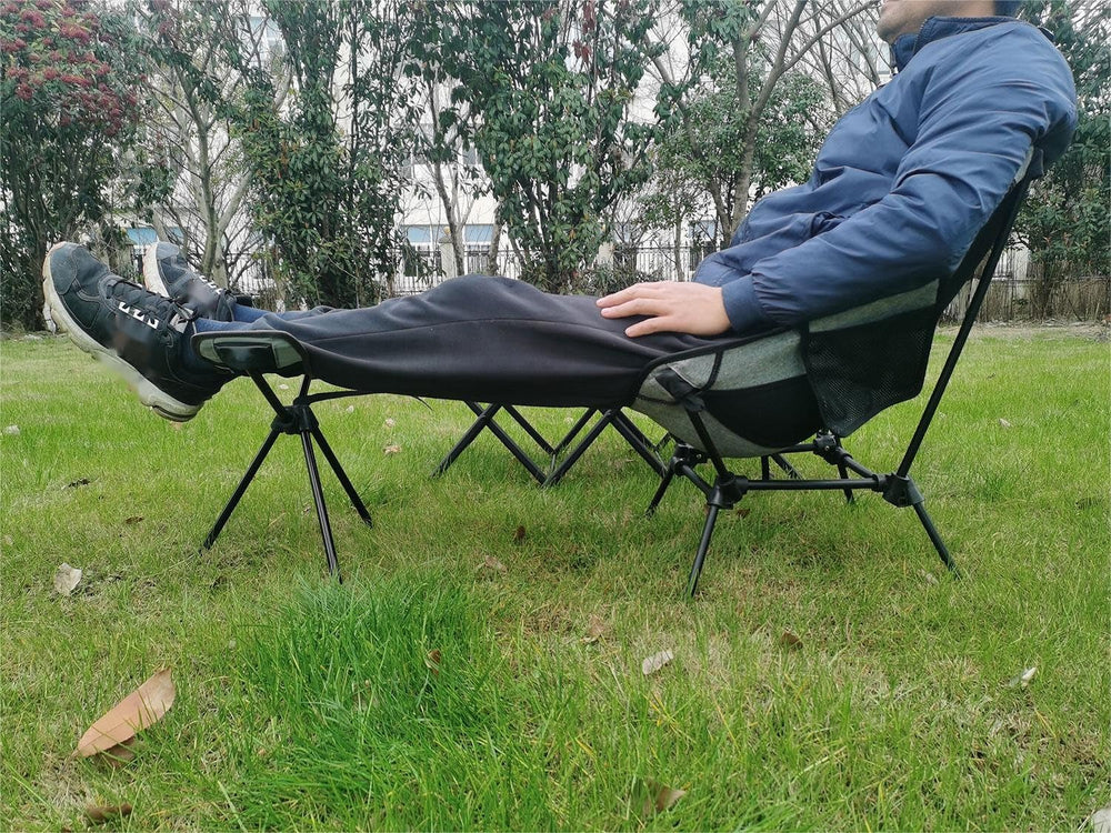 HI SUYI stool next to backpack for scale showing lightweight packable benefit