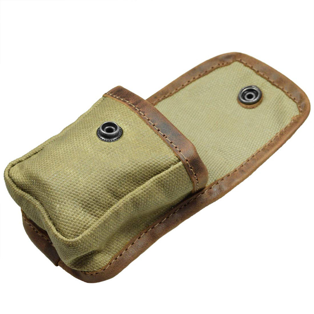 Hide & Drink pouch attached to belt in use while hiking for quick access to essentials