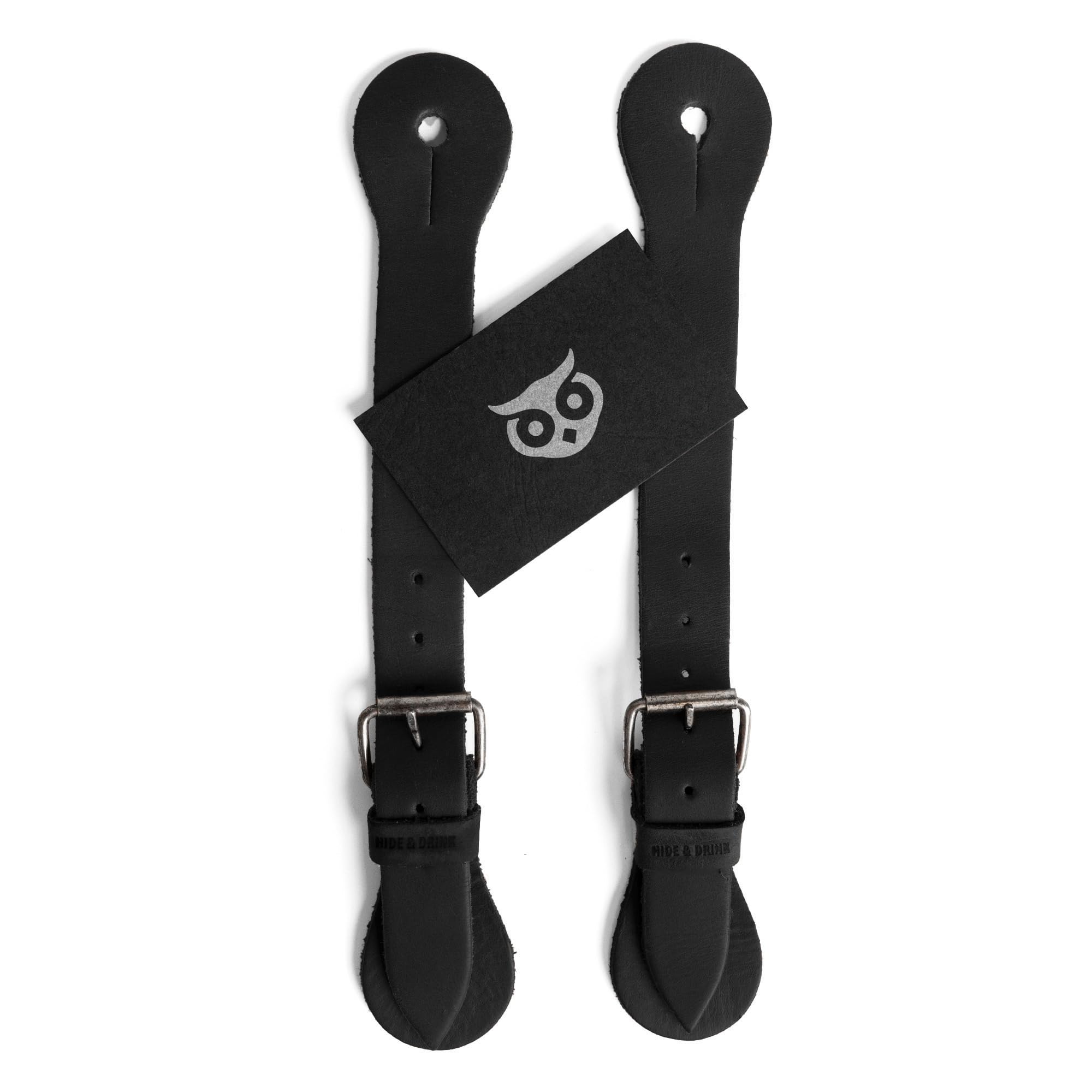 Hide & Drink spur straps in rodeo setting conveying classic western style