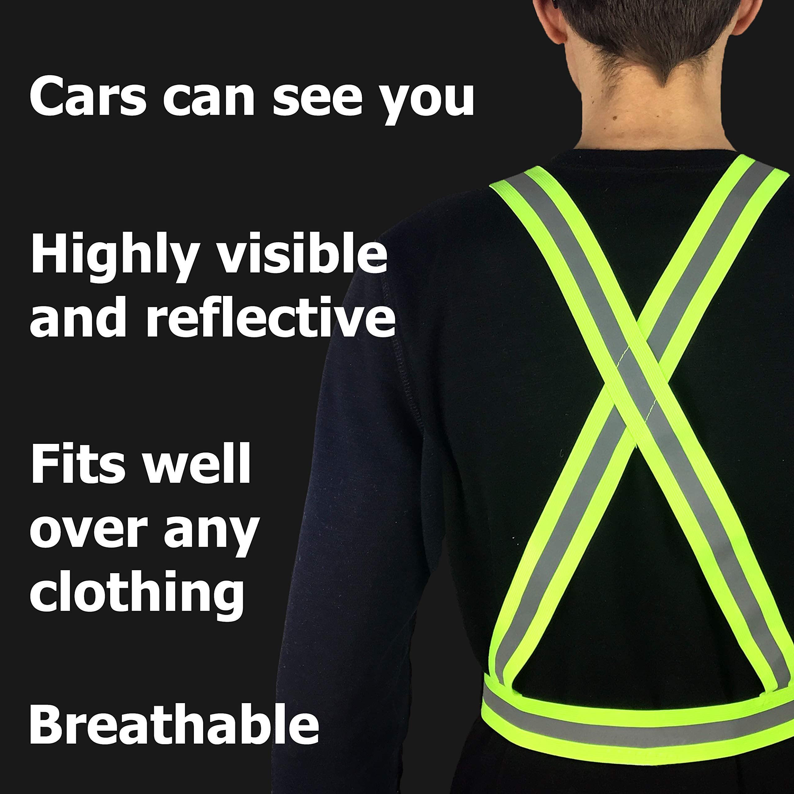 HiVisible construction worker wearing strap over jacket for enhanced roadside visibility