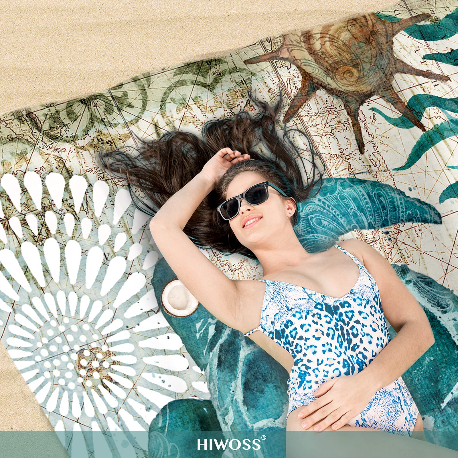 Hiwoss blanket beside towel and sunglasses showing true-size comparison benefit