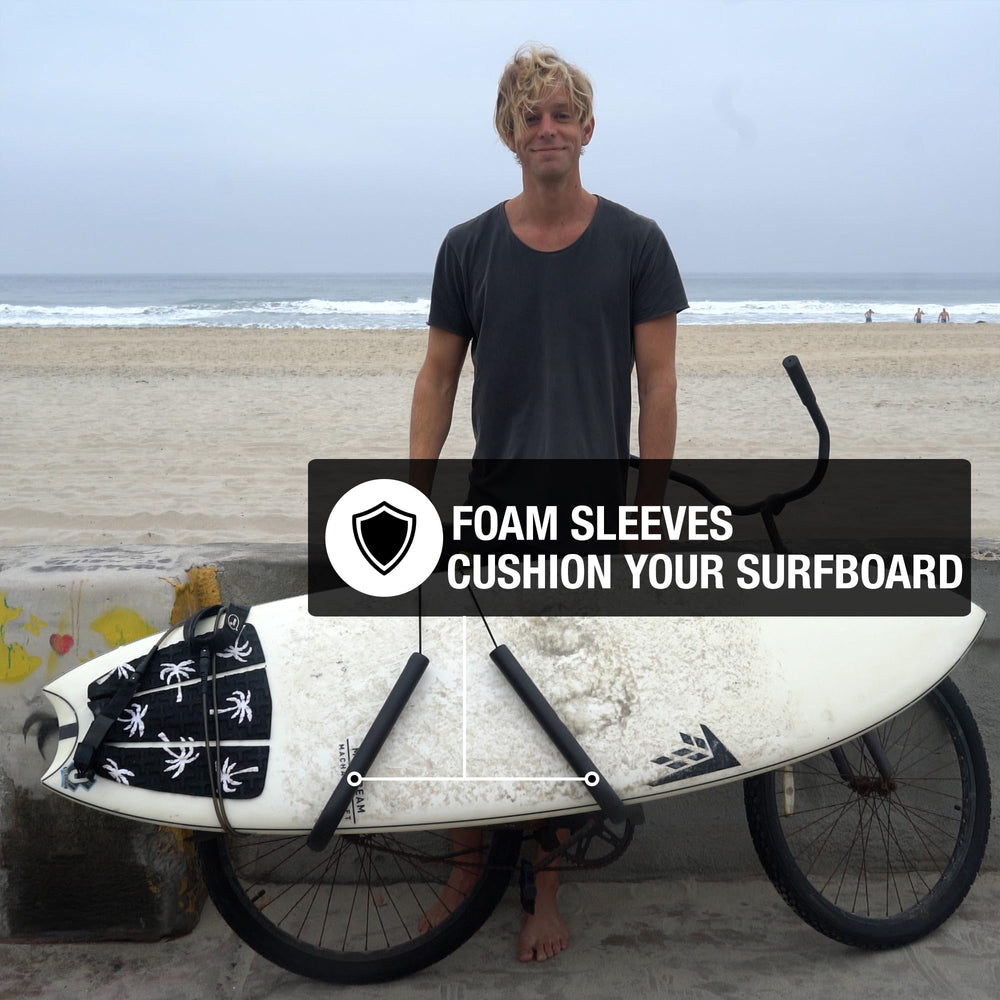 Ho Stevie! rack with surfboard next to bike for size comparison showing fit for boards up to 8 ft benefit