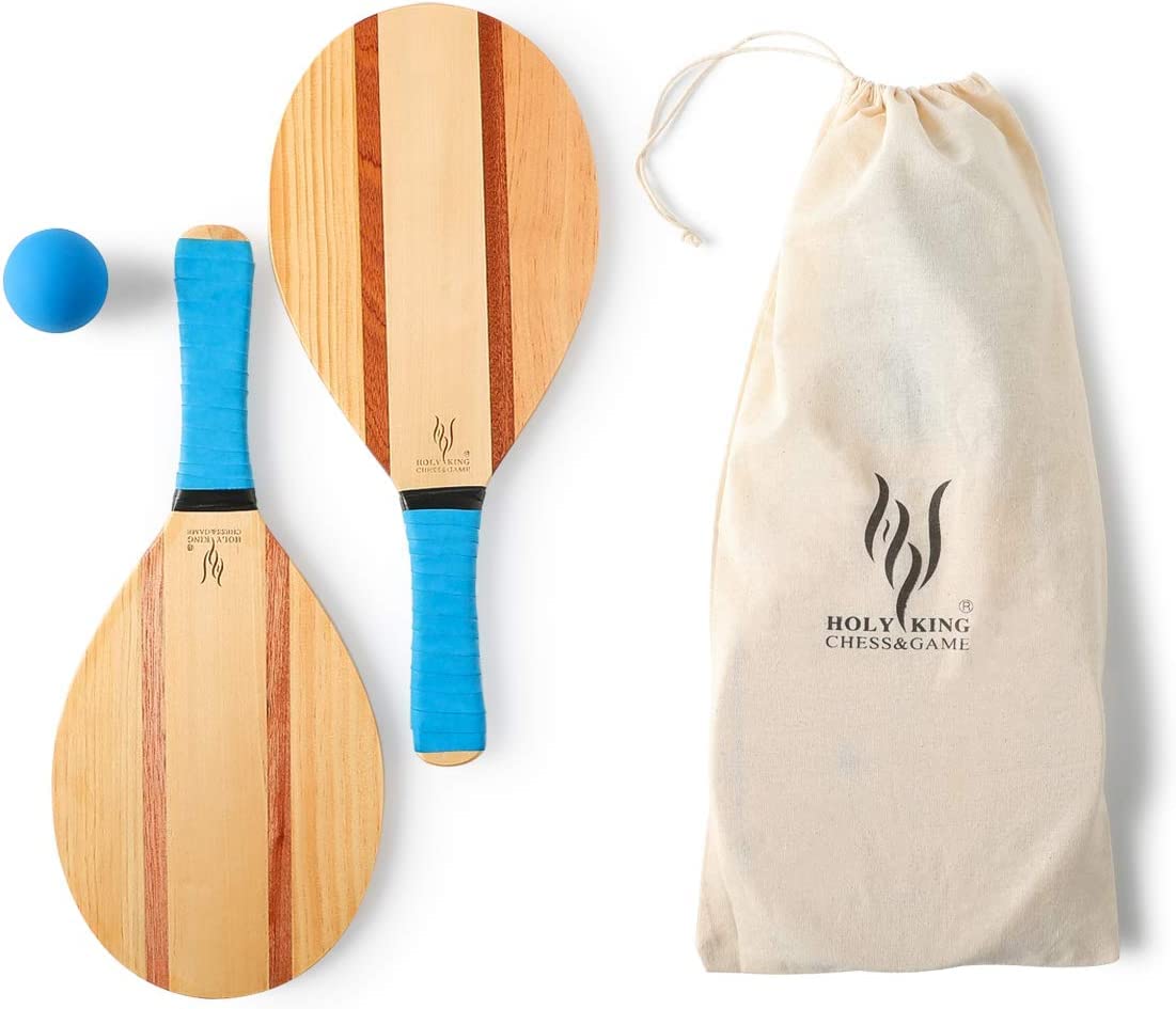 HOLYKING paddles in use on beach showing comfortable grip and playability