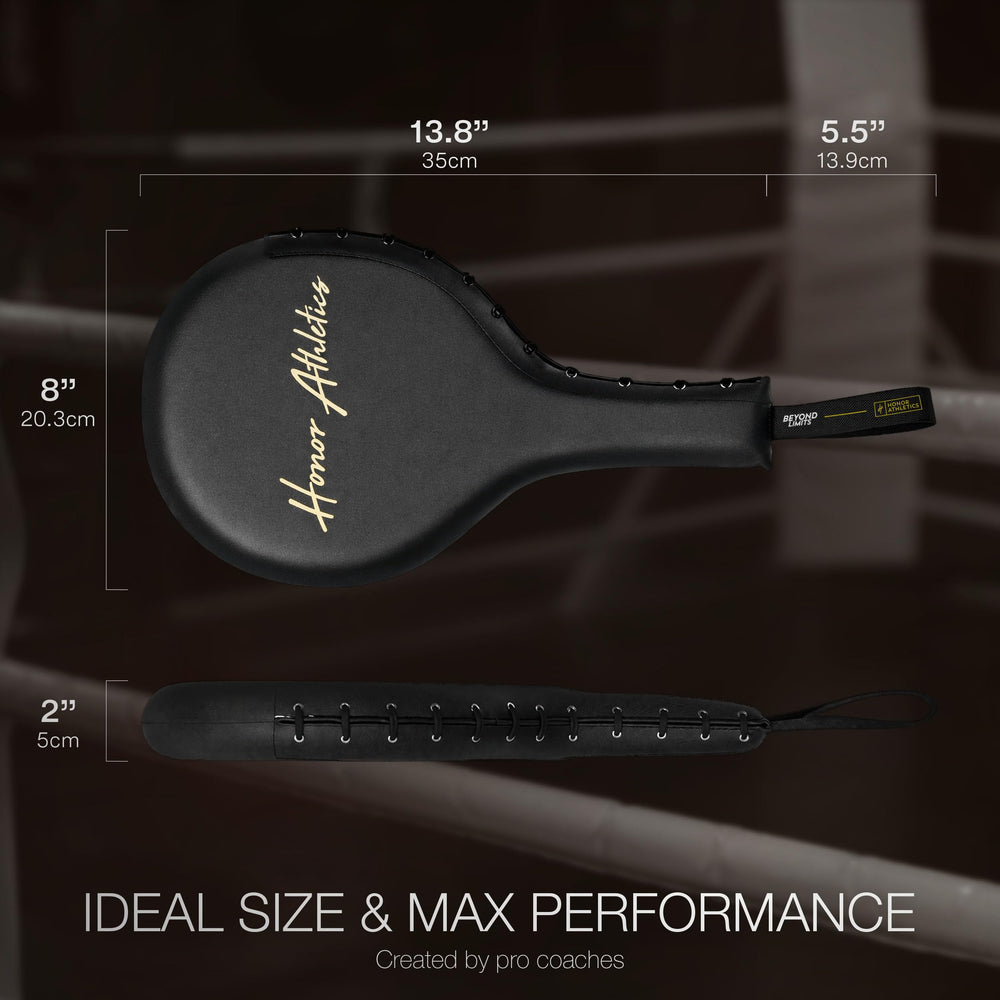 Honor Athletics paddle held by hand to show size and maneuverability for quick drills