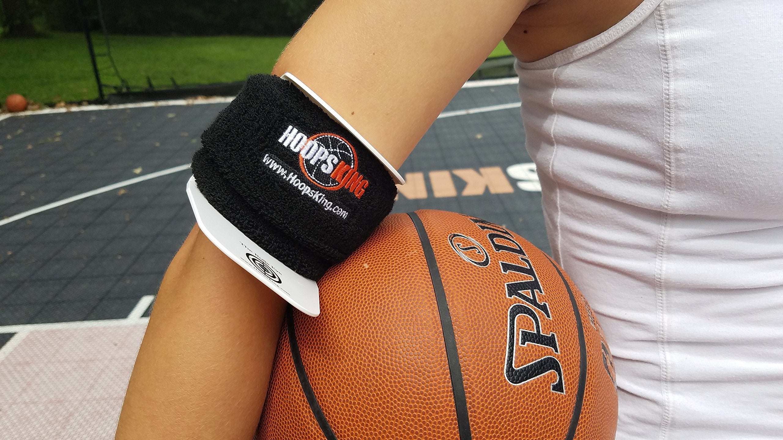 HOOPSKING BullsEye next to basketball for scale showing compact, portable training aid