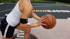 HOOPSKING BullsEye worn on shooting arm during practice demonstrating easy on-off use