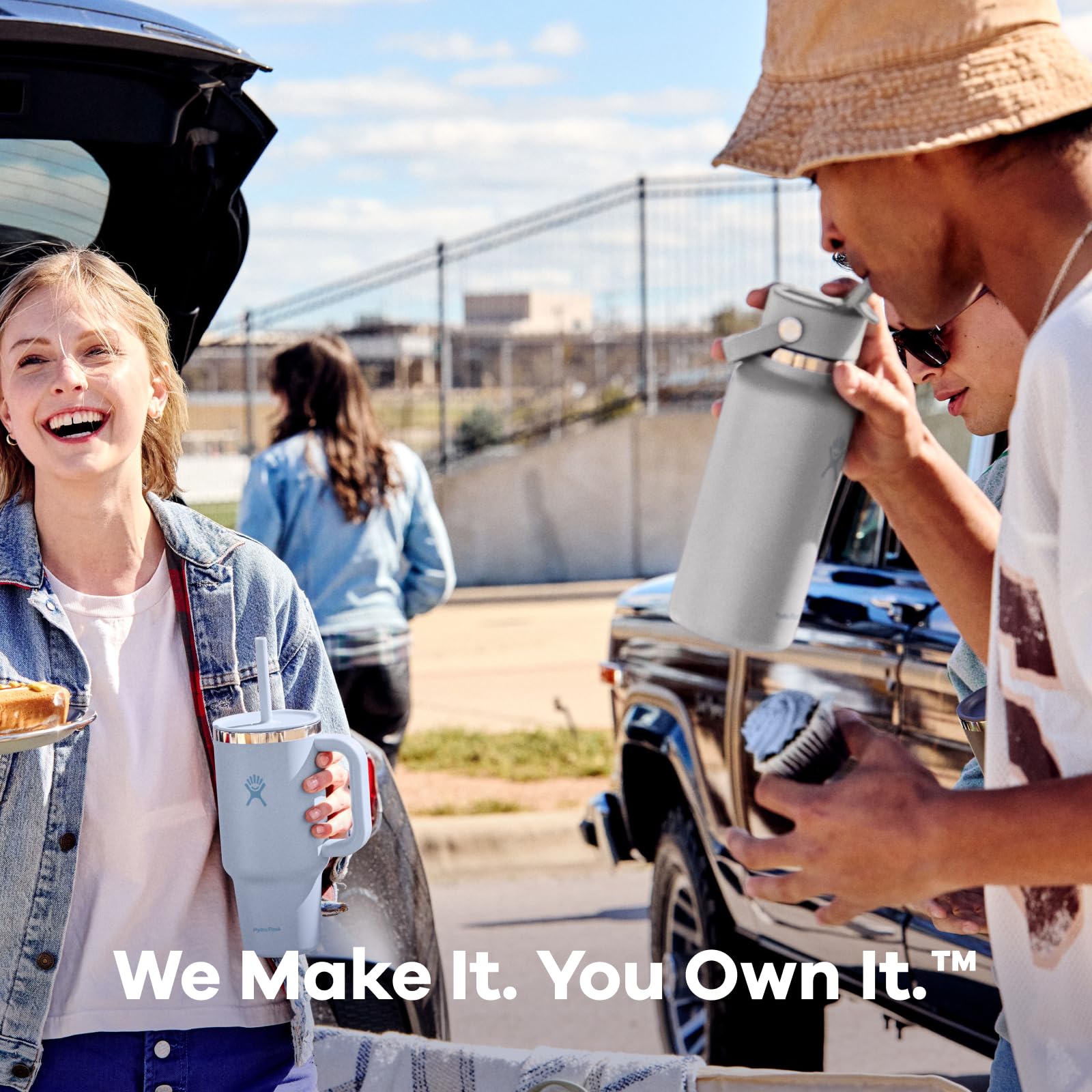 Hydro Flask in outdoor setting beside backpack, brand supporting active hydration