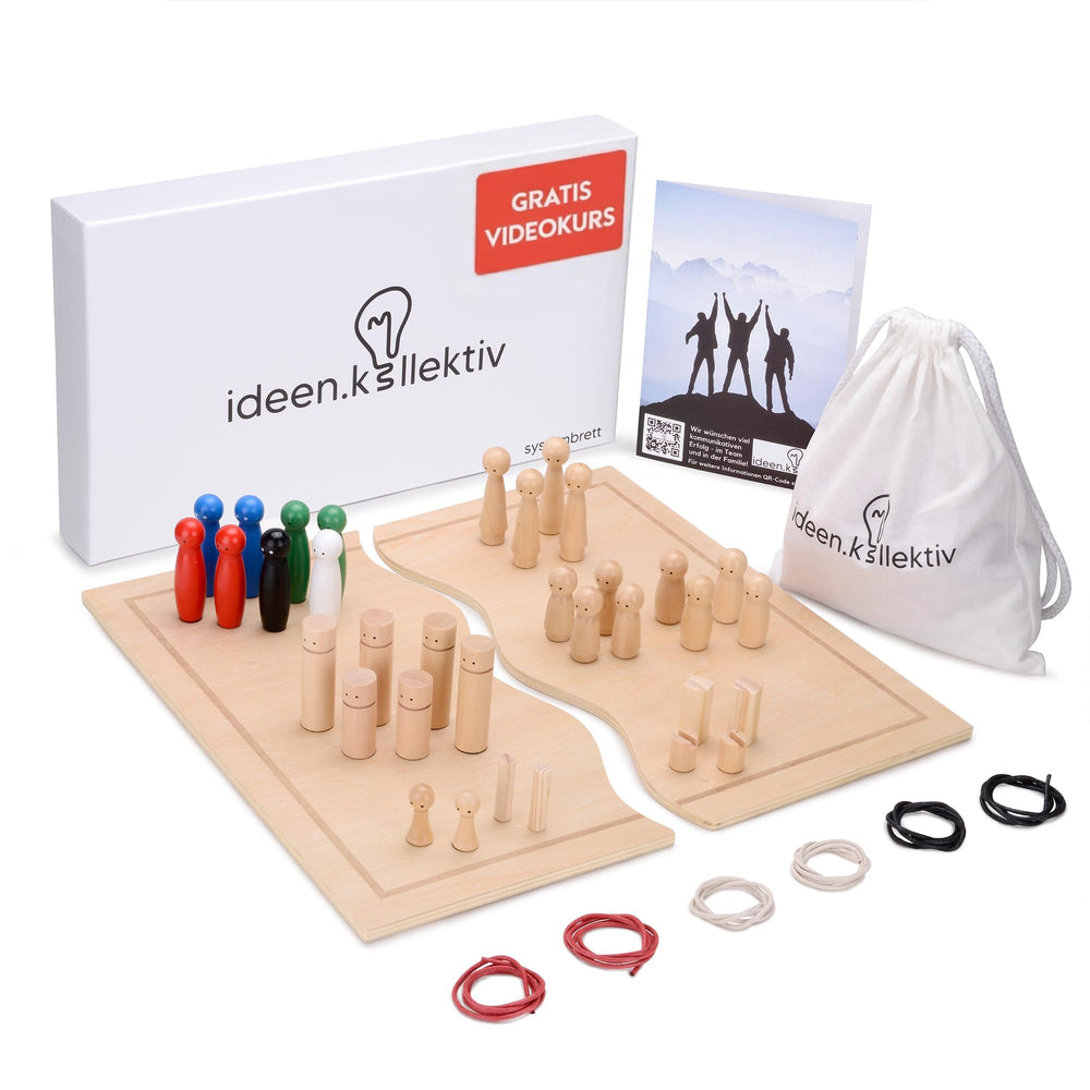 ideen.kollektiv front view of full set showing board and figures, promotes clear session setup