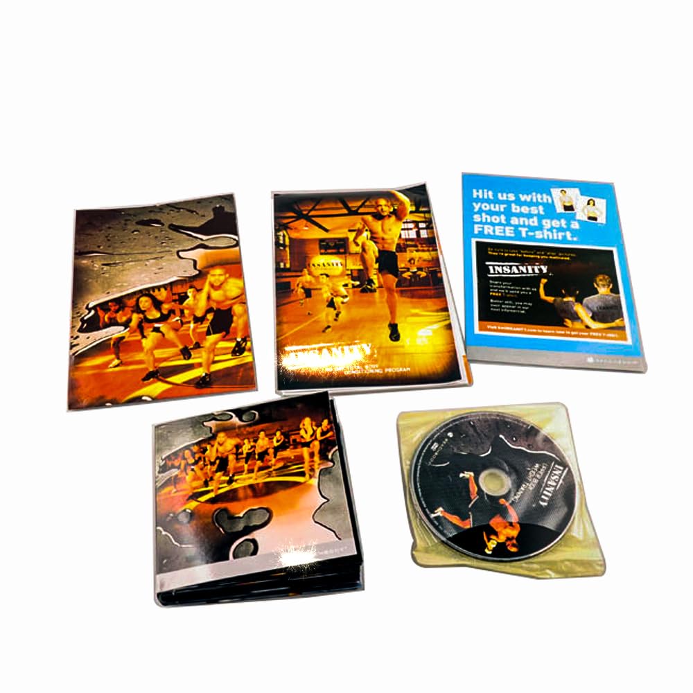 Generic Insanity stacked DVD discs close-up highlighting organized workouts
