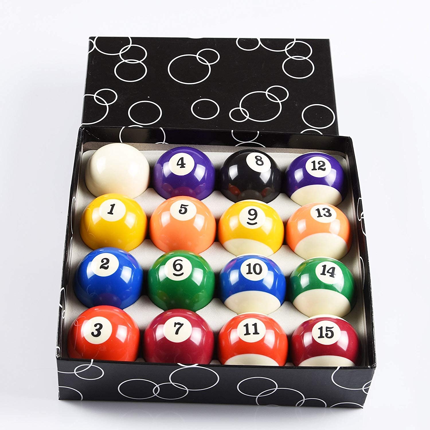ISPiRiTo ball next to a ruler and hand for scale, showing regulation 2-1/4 inch size