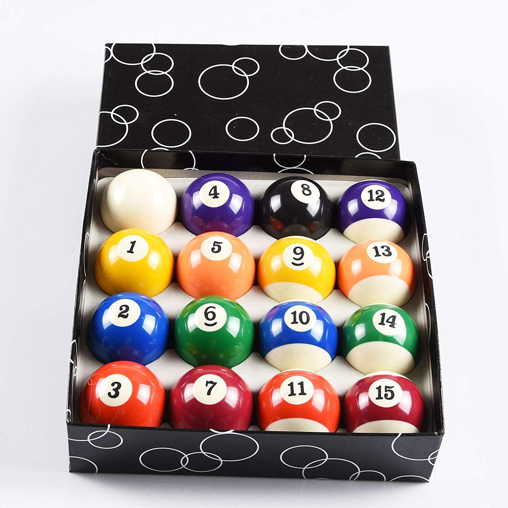 ISPiRiTo ball next to a ruler and hand for scale, showing regulation 2-1/4 inch size