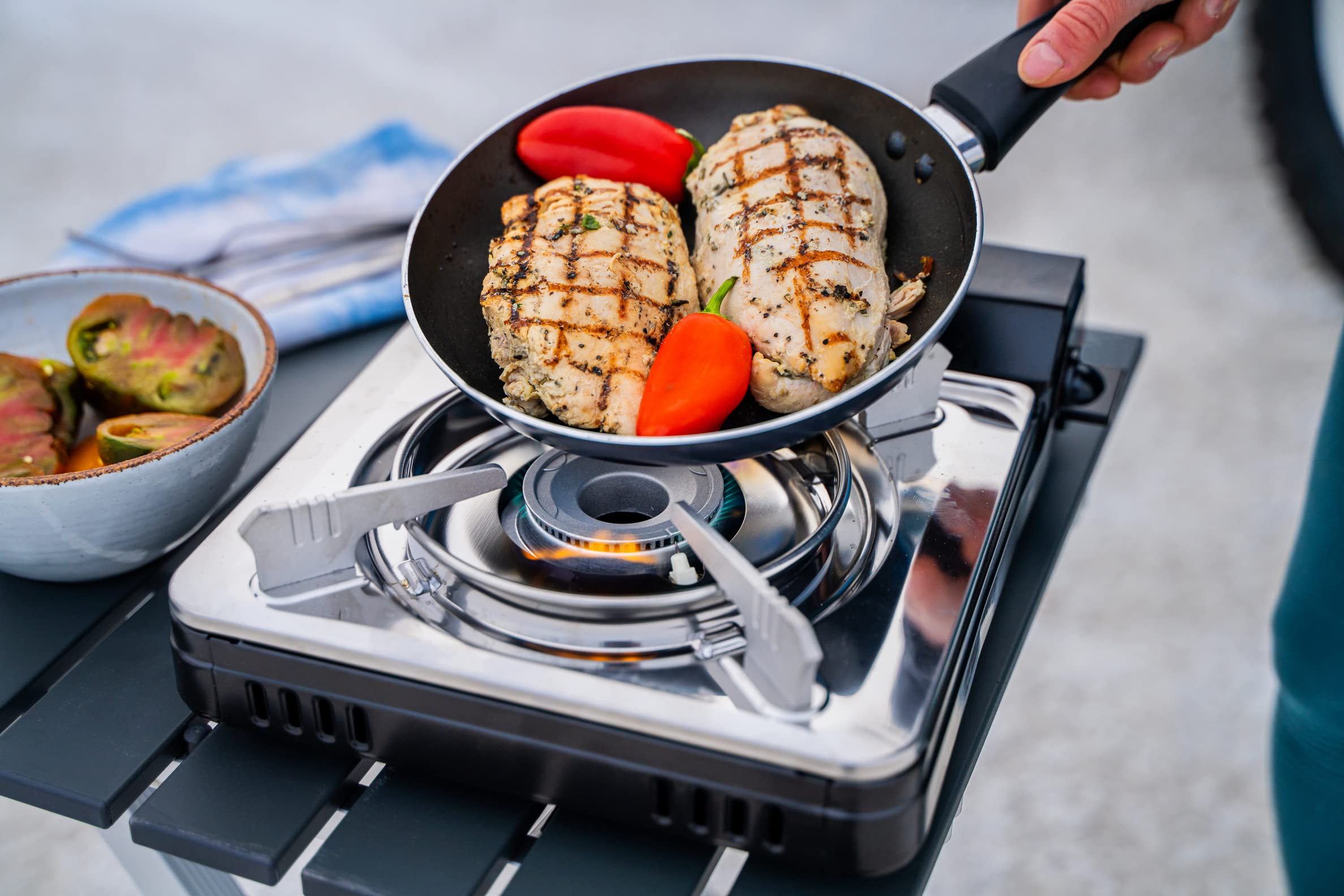 Iwatani stove in use outdoors illustrating fast cooking on the go
