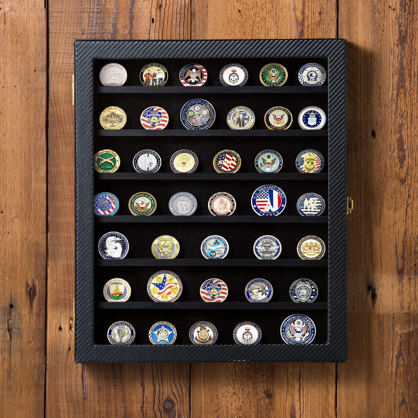 J JACKCUBE DESIGN close-up of hinged acrylic door protecting collectibles — clear visibility benefit