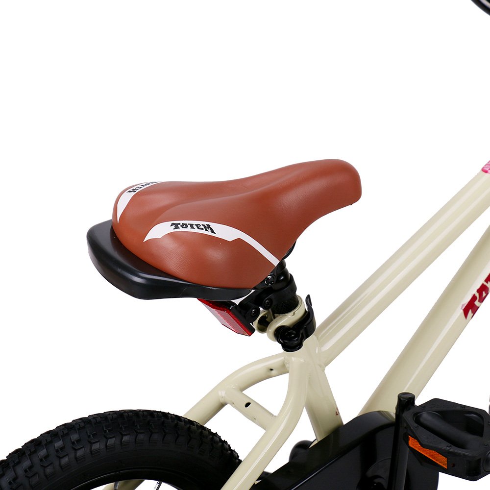 JOYSTAR child riding 16-inch bike in park building confidence and outdoor play
