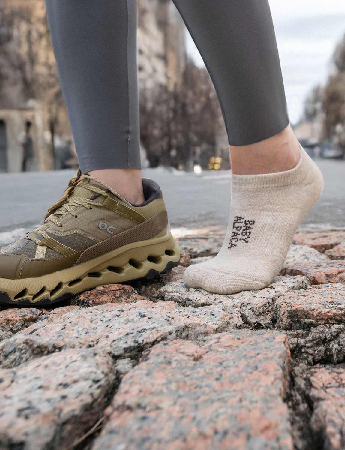 Juclise lifestyle image of person walking wearing socks showing active comfort