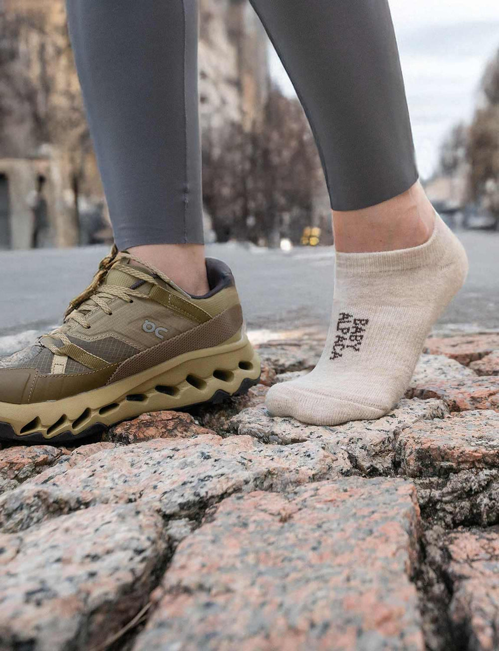 Juclise lifestyle image of person walking wearing socks showing active comfort